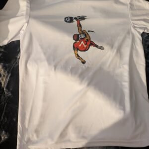 A white polyester shirt of someone doing a bicycle kick